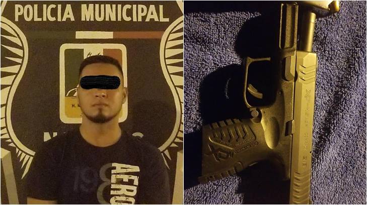 detenido y arma