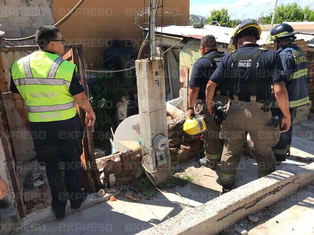 Barda de una casa se derrumba y cae sobre una señora de 58 años