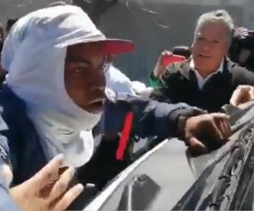 ¿Nos vas a atender?: migrantes reclaman a AMLO por justicia tras incendio