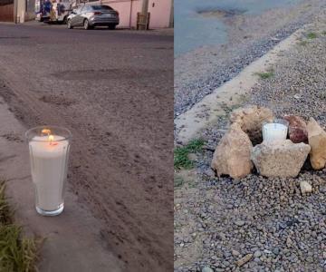 Ponen veladoras a calles de Nogales para pedir que las pavimenten