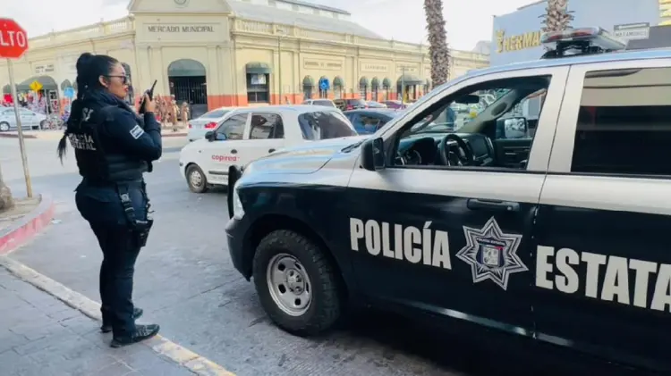 Policías vigilan comercios para evitar delitos (Foto:Especial/EXPRESO)