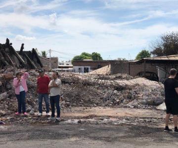 Al menos 3 personas con quemaduras en incendio de bodega, reportan vecinos