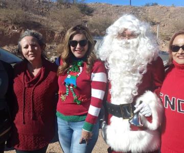 Entregan mas de 300 regalos a niños del basuron