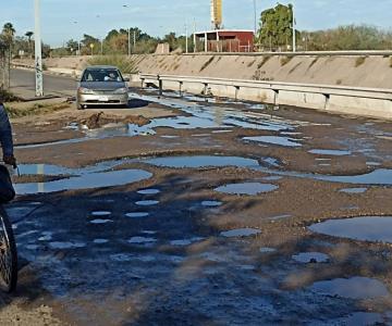 ¡No es la Luna! Brotan baches y aguas negras en Navojoa