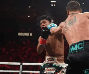 Canelo Álvarez conserva su reinado; victoria por DU ante Jaime Munguía