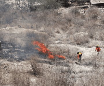 Registran incendio en Cerro de la Campana; llamas se propagan a casa