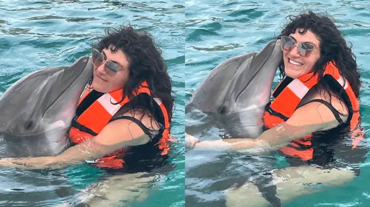 Ana Victoria y su hijo tuvieron la oportunidad de interactuar con los delfines. (Especial / EXPRESO)