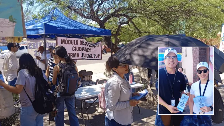Además de las mesas, reparten volantes informativos por las calles. (Foto: Ana María López)