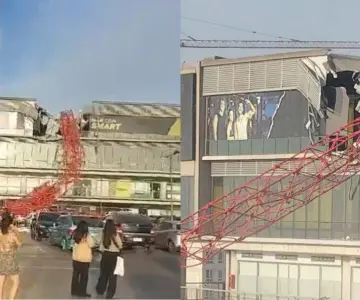 Grúa cae sobre gimnasio de un centro comercial; hay un muerto