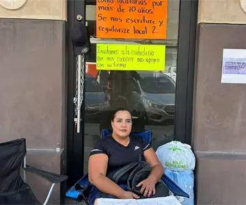 Comerciante acusa intento de apropiación de su local; anuncia mitin