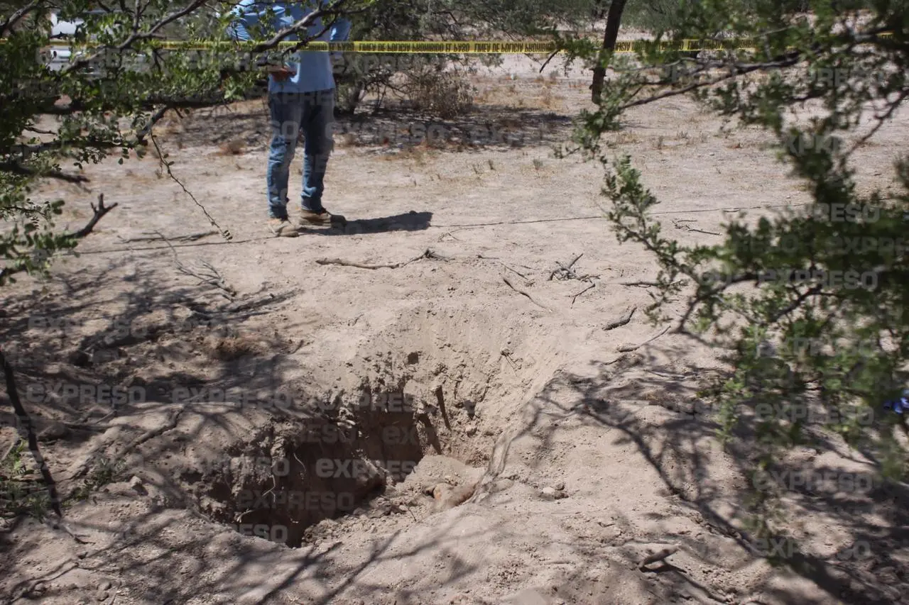 Localizan 18 cuerpos en fosas clandestinas