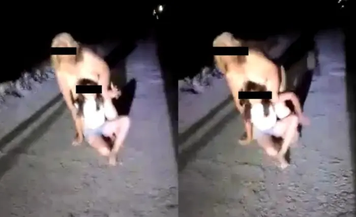 Indignante: captan a mujer golpeando a su nieta y arrastrándola para arrojarla a un canal