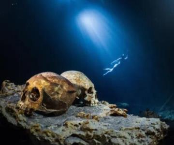 Descubren cráneos humanos en cenote de Yucatán